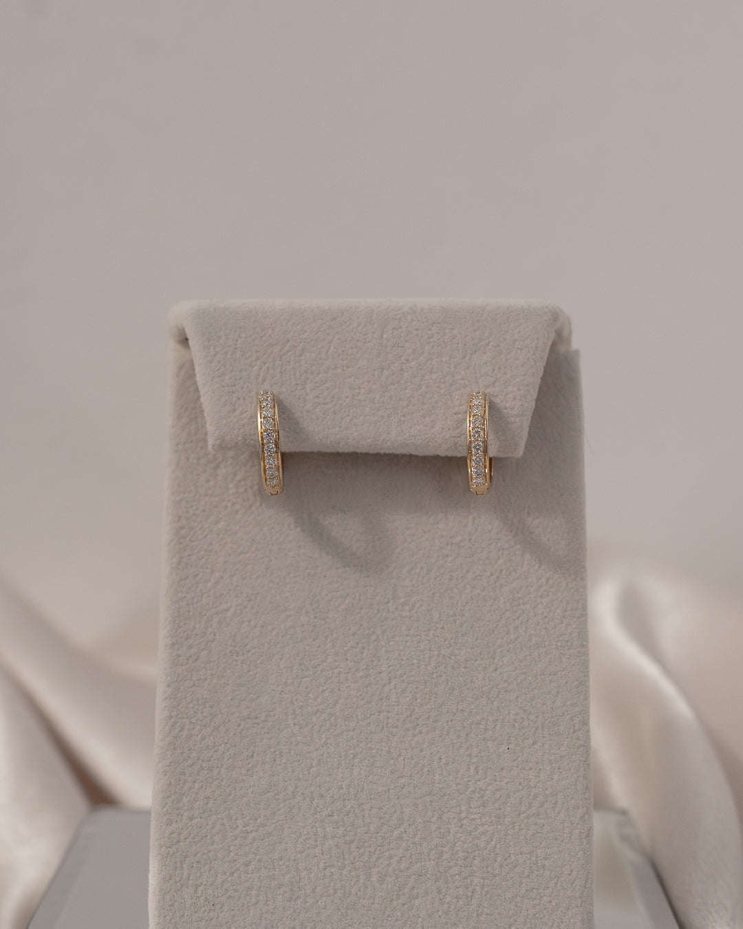 Diamond Halfway Huggie Earrings set in 14k Yellow Gold