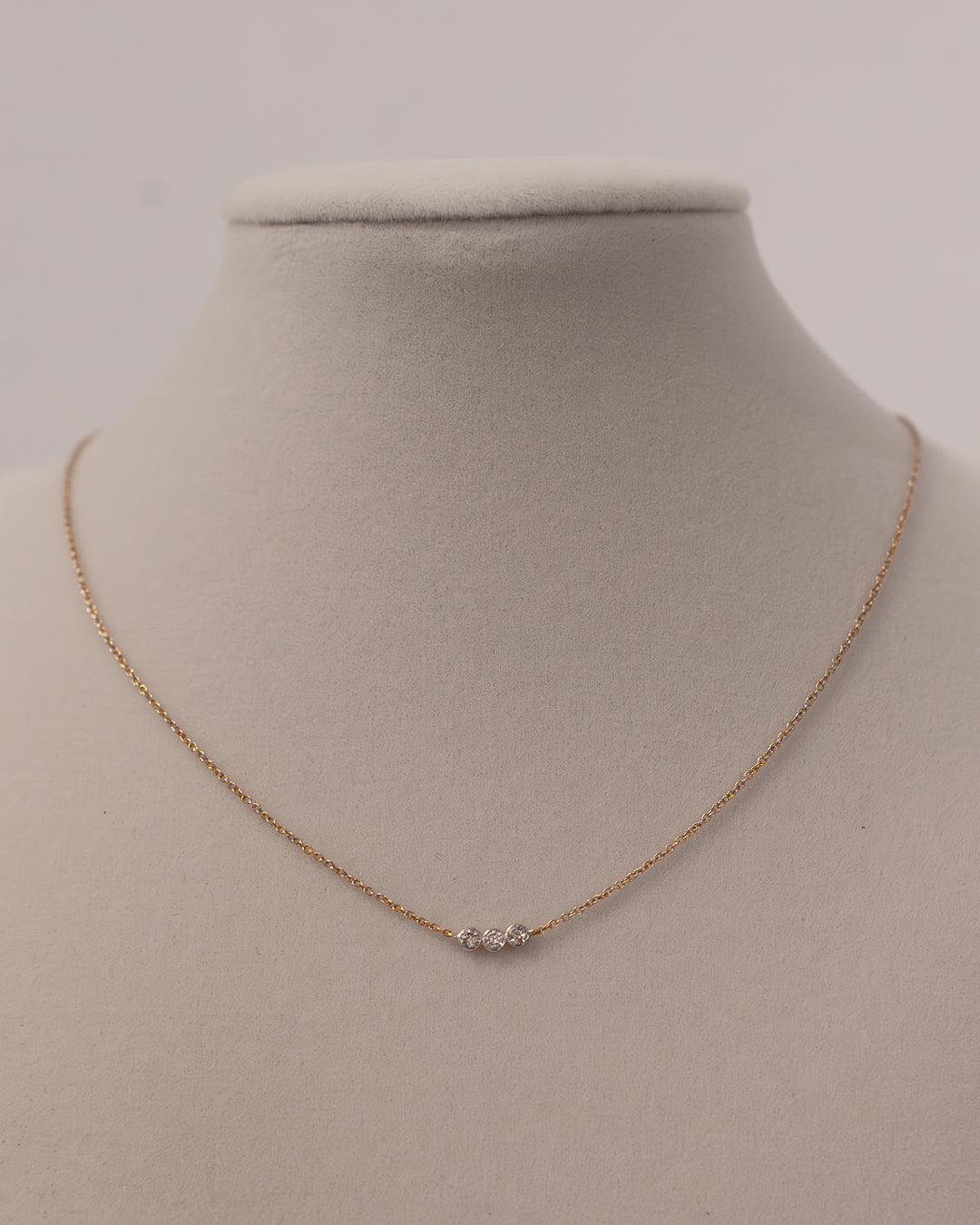 Dainty Necklace with three Bezel Set Natural Diamonds set in 14k Yellow Gold